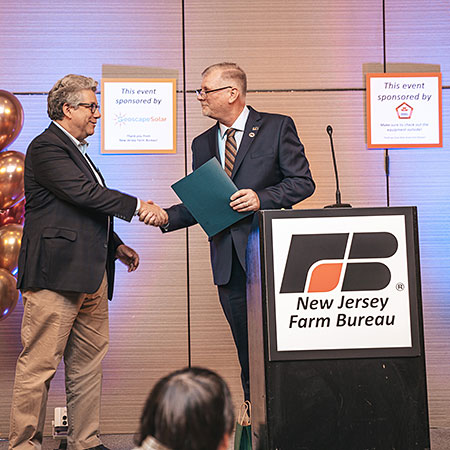 Jim Simon receiving award.